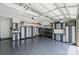 Spacious garage equipped with storage cabinets and a patterned tile floor at 2630 Mary Butler Way, Charlotte, NC 28226
