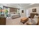 Spacious bedroom with wood accent wall, trey ceiling, and neutral tones offers a peaceful retreat at 2630 Mary Butler Way, Charlotte, NC 28226