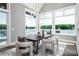 Dining area boasting lake views, modern light fixture, and stylish decor at 301 Riverwood Rd, Mooresville, NC 28117