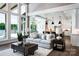 Comfortable living room with views to kitchen and lake at 301 Riverwood Rd, Mooresville, NC 28117