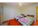 Bedroom with two twin beds and wood floors at 3016 Boston Ave, Charlotte, NC 28212