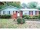 Charming single-story brick home featuring a well-maintained front yard and inviting entrance at 3016 Boston Ave, Charlotte, NC 28212