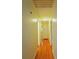 Hallway with hardwood flooring and white walls, showcasing access to multiple rooms at 3016 Boston Ave, Charlotte, NC 28212