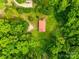 Aerial view of home nestled in lush greenery providing privacy and tranquility at 3988 Old Hickory Rd, Lancaster, SC 29720
