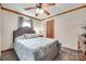 Comfortable bedroom with carpet flooring, wood trim, and natural light at 3988 Old Hickory Rd, Lancaster, SC 29720