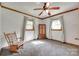 Empty bedroom featuring neutral walls, wood trim, carpet, and large windows at 3988 Old Hickory Rd, Lancaster, SC 29720