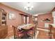 Cozy dining room featuring hardwood floors, a classic table, and charming decor with lots of character at 3988 Old Hickory Rd, Lancaster, SC 29720