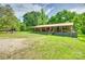Charming covered porch with rocking chairs offer a relaxing outdoor space at 3988 Old Hickory Rd, Lancaster, SC 29720