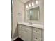 Bathroom featuring a modern vanity with a white countertop and chrome fixtures at 4504 Bellmore Ct, Charlotte, NC 28269