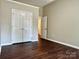 Bedroom with hardwood floors and closet at 4504 Bellmore Ct, Charlotte, NC 28269