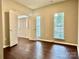Spacious living room with hardwood floors and plenty of natural light at 4504 Bellmore Ct, Charlotte, NC 28269