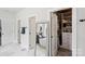 Hallway view into an elegant bathroom with a freestanding tub and walk-in closet at 4530 Tournette Dr # 18, Indian Land, SC 29707