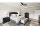 Spacious bedroom features a large bed, dresser, and a ceiling fan at 4530 Tournette Dr # 18, Indian Land, SC 29707