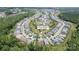 Neighborhood aerial view featuring a well-planned layout with lush green spaces and mature trees at 4975 Looking Glass Trl, Denver, NC 28037