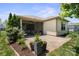 Landscaped backyard with patio and outdoor living space at 4975 Looking Glass Trl, Denver, NC 28037