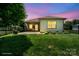 Green backyard features a patio area and lush green space for outdoor activities and relaxation at 4975 Looking Glass Trl, Denver, NC 28037