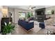 Modern living room featuring a sleek fireplace, stylish furniture, and access to an outdoor patio at 4975 Looking Glass Trl, Denver, NC 28037