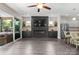 Open-concept living room featuring a modern fireplace, recessed lighting, and access to the kitchen at 4975 Looking Glass Trl, Denver, NC 28037