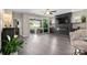 Bright living room with hardwood floors, a sleek fireplace, and sliding doors to the outside at 4975 Looking Glass Trl, Denver, NC 28037