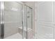An elegant glass shower in the home bathroom at 4975 Looking Glass Trl, Denver, NC 28037