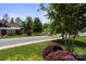 Pleasant street view showcasing well-maintained lawns and mature trees in a desirable neighborhood at 4975 Looking Glass Trl, Denver, NC 28037