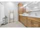 Bright bathroom featuring a double vanity, modern fixtures, and a tile floor at 5523 Meadow Haven Ln, Charlotte, NC 28270