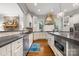 Bright kitchen featuring stainless appliances, granite counters, and open layout at 5523 Meadow Haven Ln, Charlotte, NC 28270