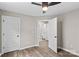 Bedroom with a ceiling fan and view to ensuite bathroom at 626 W Bell St, Statesville, NC 28677