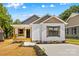 Charming single-story home with a welcoming porch and well-manicured landscaping in a vibrant community at 626 W Bell St, Statesville, NC 28677