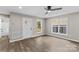 Inviting living room with neutral walls, vinyl floors, and a large window that provides plenty of natural light at 626 W Bell St, Statesville, NC 28677