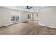 Bright living space with vinyl floors and natural light streaming through the windows at 626 W Bell St, Statesville, NC 28677
