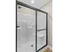 Enclosed shower features black trim and built in shelves at 626 W Bell St, Statesville, NC 28677