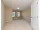 Spacious bedroom featuring neutral walls, plush carpet, and bright natural lighting at 6505 Central Pacific Ave, Charlotte, NC 28210