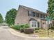 Charming brick townhome with a landscaped yard, and attached garage on a street corner at 6505 Central Pacific Ave, Charlotte, NC 28210