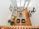 Airy living room boasts hardwood floors, modern decor, and oversized windows at 6505 Central Pacific Ave, Charlotte, NC 28210
