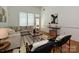 Comfortable living room features hardwood floors, modern decor, and an airy atmosphere with lots of natural light at 6505 Central Pacific Ave, Charlotte, NC 28210