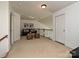 Cozy bonus room with a neutral carpet, decorative pillows, and iron railing at 6505 Central Pacific Ave, Charlotte, NC 28210