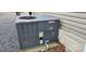The Goodman AC unit sits on a concrete pad at 6641 Monford Dr # 54, Conover, NC 28613