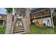 Backyard area with a wooden staircase and patio furniture at 6641 Monford Dr # 54, Conover, NC 28613