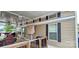 A covered porch features an outdoor seating area with a ceiling fan and a view at 6641 Monford Dr # 54, Conover, NC 28613