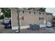Exterior shot of home with tan siding, black shutters, and an external AC unit at 6641 Monford Dr # 54, Conover, NC 28613