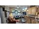 Comfortable living room with fireplace, lake views, and adjacent dining at 6641 Monford Dr # 54, Conover, NC 28613