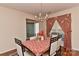 Cozy dining room with hardwood floors and seating for six at 7007 Broad Leaf Ct, Indian Trail, NC 28079