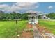 Scenic gazebo surrounded by lush greenery, offering a tranquil outdoor space at 7007 Broad Leaf Ct, Indian Trail, NC 28079