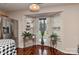 Bright kitchen with stainless steel appliances, hardwood floors, and a bay window with outdoor view at 7007 Broad Leaf Ct, Indian Trail, NC 28079