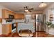 Bright kitchen featuring stainless steel appliances, wooden cabinets and an island at 7007 Broad Leaf Ct, Indian Trail, NC 28079