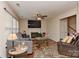 Cozy living room featuring a fireplace, large television, and comfortable seating at 7007 Broad Leaf Ct, Indian Trail, NC 28079