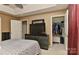 Main bedroom with hardwood floors and access to the closet at 7007 Broad Leaf Ct, Indian Trail, NC 28079
