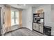Cozy dining area with a built-in cabinet, large window, and ample natural light at 7442 Crestside Ln, Charlotte, NC 28227
