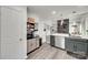 Well-equipped kitchen with gray cabinets, stainless steel appliances, and a convenient open layout at 7442 Crestside Ln, Charlotte, NC 28227